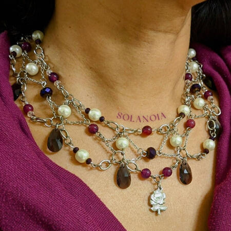 Woman wearing FLORA necklace and earrings set with a magenta low cowl neck collar. Perfect jewelry for regal and formal attire and events, parties, prom, ball style. Pair with sweetheart neckline dress or blouse